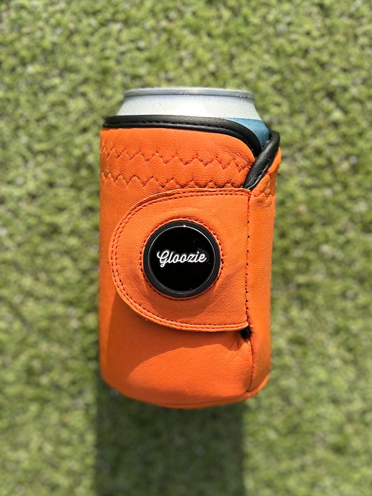 Orange golf glove Gloozie coozie with branded ball marker
