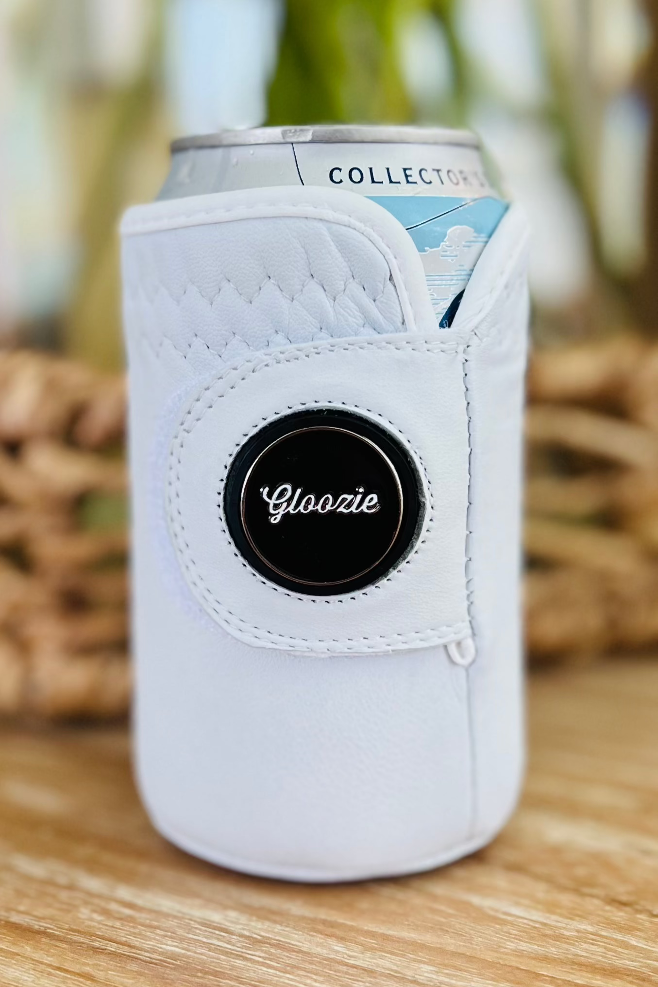 Original Gloozie golf glove coozie sitting on a table 